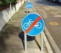 Cycle path end sign and behind it the sign of bike path Royalty Free Stock Photo