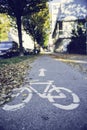 Cycle track, autumn, bike symbol on the floor Royalty Free Stock Photo