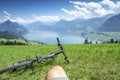 Cycler relaxes on top of Lake Lucerne