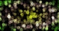 Abstract loop background with animated glowing yellow green bokeh