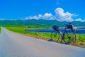 Cycling along the rice fields Royalty Free Stock Photo