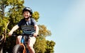 Cycling around the block. a young boy riding his bicycle through his neighbourhood. Royalty Free Stock Photo