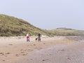 Cycling on the beach with the dog