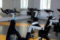 Cycling bikes in the fitness class Royalty Free Stock Photo