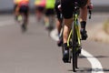 Cycling competition cyclist athletes riding a race at high speed Royalty Free Stock Photo