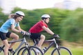 Cycling Concept: Young Caucasian Couple on Speedy Trip