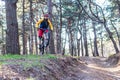 Cycling, a cyclist in bright clothes riding a mountain bike on the edge of the slope. Active lifestyle Royalty Free Stock Photo