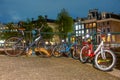 Cycling Family : on the Canal Embankment in Amsterdam at Night
