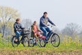 Cycling family enjoys the nice spring weather, Brabant, Netherlands