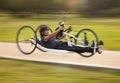 Cycling, fitness and fast with man and handcycle in nature for training, sports and challenge. Exercise, workout and