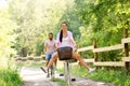 Happy couple with bicycles at summer park Royalty Free Stock Photo