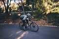 Cycling, nature and relax with man on road for training, workout or cardio exercise. Adventure, extreme sports and speed