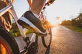 Cycling outdoors, close up of the feet on bicycle
