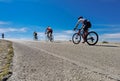 Cycling race on an uphill road in Ioannina, Greece, four bikers and bikes Royalty Free Stock Photo