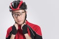 Cycling Safety Concept and Ideas. Portrait of Male Caucasian Cyclist Putting On Helmet. Royalty Free Stock Photo