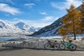 Cycling scene in winter in the italian alps Royalty Free Stock Photo