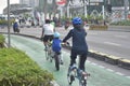 Cycling on the streets of Jakarta City during car-free day