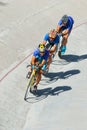 Cycling team racing on velodrome