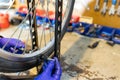 Cycle mechanist working on spokes on wheel in workshop