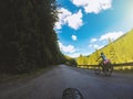 Cycling tourism. People travel on bicycles among the mountains