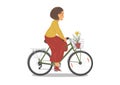 Cycling woman with daffodile flower in basket.