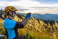 Cycling woman riding on bike in autumn forest landscape. Woman cycling MTB flow trail track. Outdoor sport activity Royalty Free Stock Photo