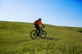 Cyclist on the Beautiful Meadow Trail Royalty Free Stock Photo