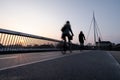 Cyclist on a bicycle bridge in Odense, Denmark