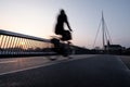 Cyclist on a bicycle bridge in Odense, Denmark