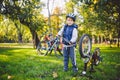 Cyclist boy Bike repair. little boy fixing his bike. Children mechanics, bicycle repair profession. Learning about cycles and Royalty Free Stock Photo