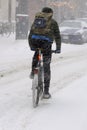A cyclist in winter snow