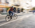 Cyclist on the city roadway in motion blur Royalty Free Stock Photo