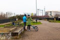 Cyclist couple riding bikes in a park