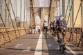 Cyclist crossing Brooklyn Bridge that connects Brooklyn and Manhattan Royalty Free Stock Photo