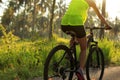 Cyclist cycling mountain bike on tropical forest Royalty Free Stock Photo