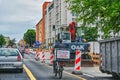 Cyclist in a dedicated cycle lane on a main road