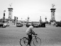 Cyclist in front of Pont Alexandre III