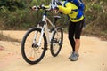 Cyclist getting injured while falling from mountain bike Royalty Free Stock Photo