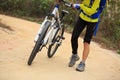 Cyclist getting injured while falling from mountain bike Royalty Free Stock Photo