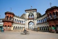 Cyclist goes through the old indian street