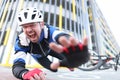 Cyclist in helmet falling off his bike and screaming Royalty Free Stock Photo