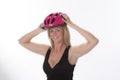 Cyclist holding safety helmet