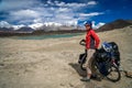 Cyclist at Kara Kul lake Royalty Free Stock Photo