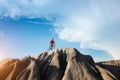 Cyclist man riding a mountain bike up a hill, extreme sport mountain biker