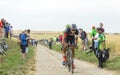 The Cyclist Matthias Brandle Riding on a Cobblestone Road - Tour