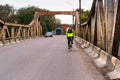 Cyclist on the old iron bridge