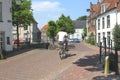 Student is cycling in the walled old town of Amersfoort,Netherlands Royalty Free Stock Photo