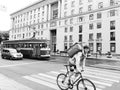 A cyclist passes a pedestrian crossing