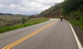 Cyclist pedaling on dual paved road. bike on the road, speed on the bike