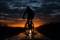 Cyclist pedals through twilight, embracing the serenity of evening riding